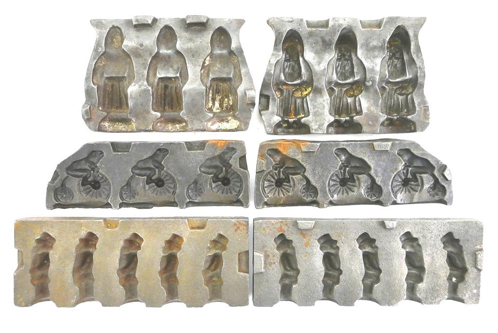 3 Antique Lead Character Toy Molds: Three antique iron two part molds for casting lead toys, includes a combined 5 Andy Gump, 3 Santa and 3 frog riding penny farthing bicycle, largest mold 8.25"L