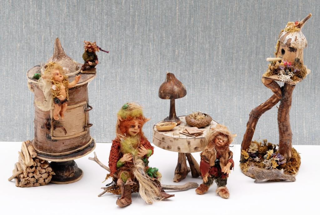 Donna Harrington Fairy Dolls & Accessories: Four hand made artisan clay fairy dolls attributed to Helen Hartzells [tallest 3.5"], adult fairy sitting on a log wearing leather boots while weaving, standing fairy 2.5"H, flying fairy 2"H, small ch