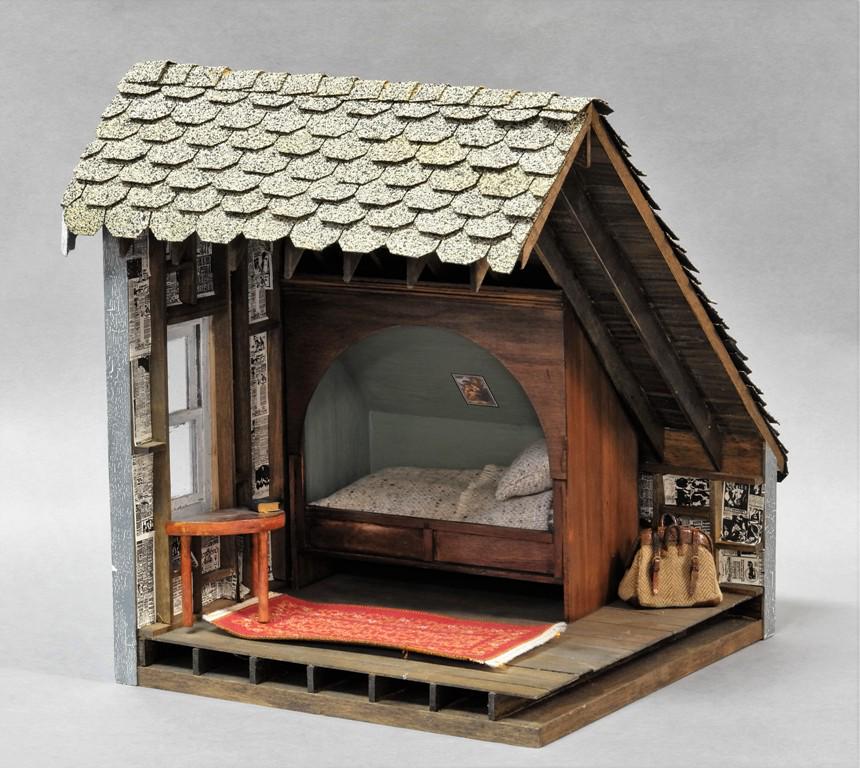 Dollhouse Room Box Attic Bedroom: Well made small attic bedroom room box, wood construction with asphalt shingles, exterior siding with distressed paint, single window, exposed eaves, exposed studs with newspaper insulation, nicely ma