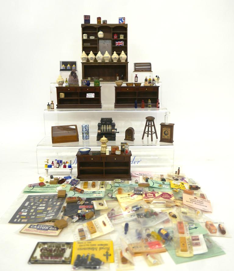 Dollhouse Country Store Fixtures & Accessories: Set of three matching wood Bespaq store counters with two drawers over open shelves, paneled sides and fronts 5 3/8"L, high set of store shelves 6"W, 7.25"H ,two counter top display cases, stool, cash