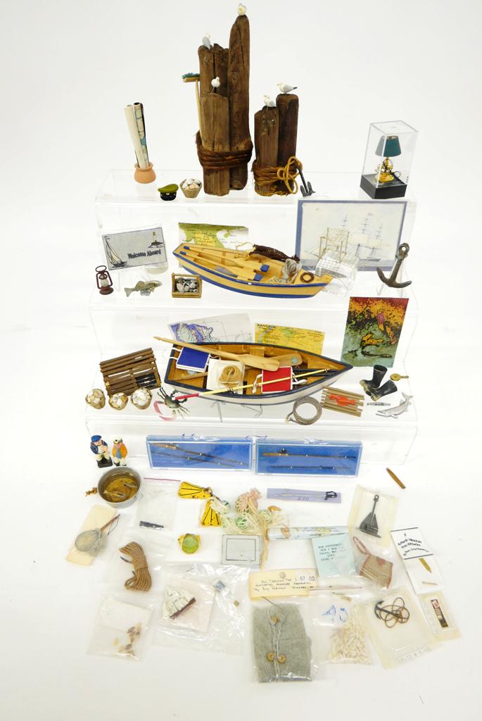 Dollhouse Nautical Accessories, Large Assortment: Interesting group of nautical themed accessories, electrified sextant lamp, worn piling with seagulls, two wood rowboats 7" and 8" long, ropes, floats, baskets of shells, fishing rods, crab and lobste