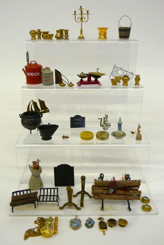 Assorted Dollhouse Metal & Fireplace Accessories: Group of heavy turned brass vases and spittoon, brass candelabra, scale, small kitchen accessories, Bodo Hennig Weck cooker with apple cider crock in O.B., lock grates, brass andirons and coal scuttle