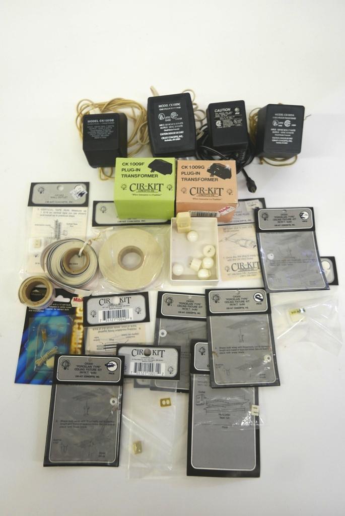 Dollhouse Electrical Components: Two dollhouse transformers in original boxes, four used transformers, rolls of wiring, outlets, plugs, ceiling kits etc.