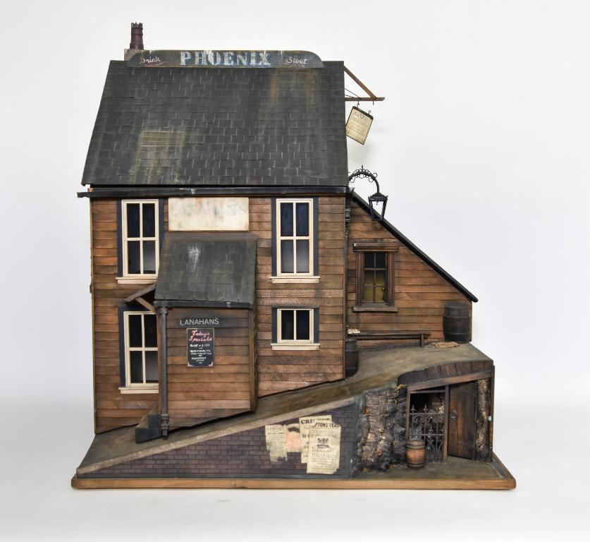 Steve Hilbert Victorian Pub Dollhouse: Steve Hilbert of Chapel Road Miniatures, Bexleyheath, Kent, England, artisan Victorian style pub, two story pub built into the side of a faux hill, opening front with hinged entry door give access to 