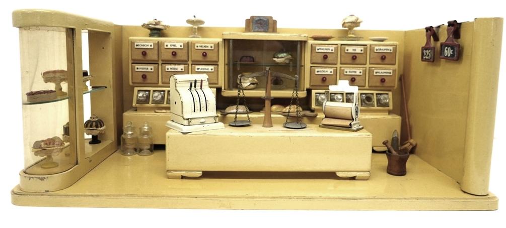 Vintage German Store Room Box Dollhouse: Vintage German painted wood Bakery box 30"W, 12.5"D, 11.5"H, contains built in cake displays and rear display with drawers and glass candy canisters, original counter, great selection of vintage compo
