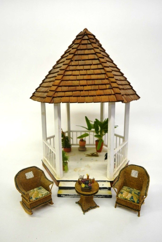 Dollhouse Gazebo, Sandy Knight Wicker Set: Wood dollhouse scale gazebo, removable roof with individual wood shingles, wood frame, foundation and steps with brick trim around bottom edge, includes a rattan style rocker, armchair and round table