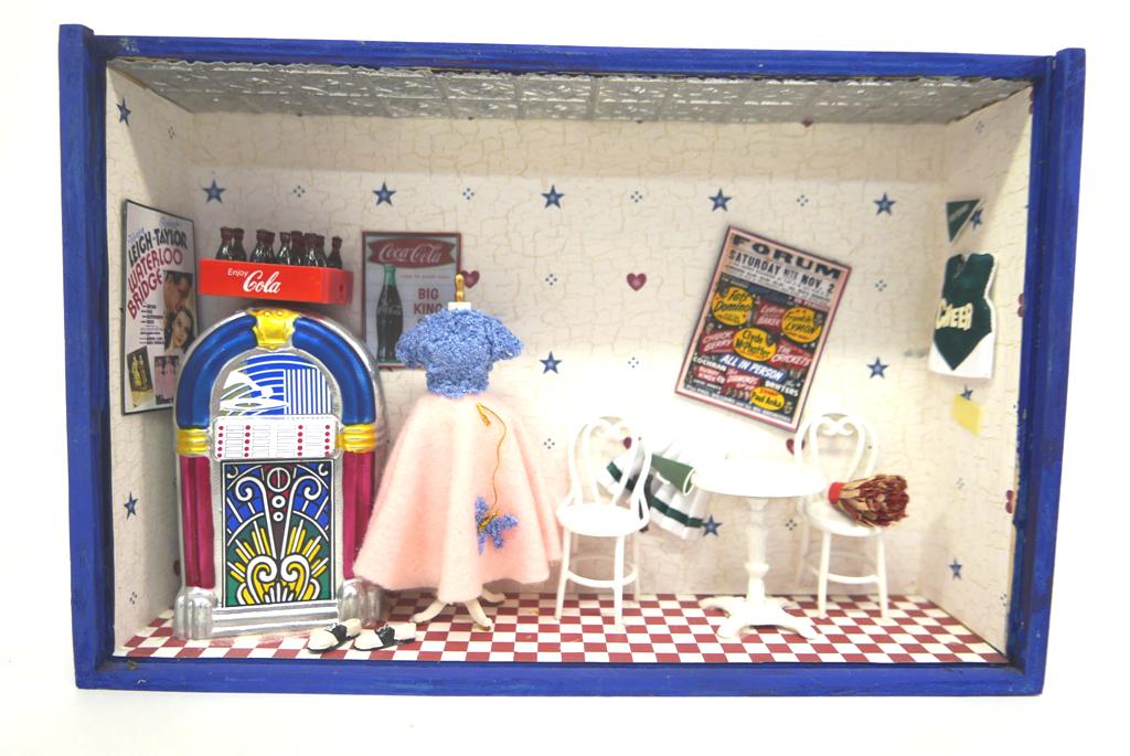 Dollhouse 1950's Juke Joint & Others: Nicely made hanging wood diorama box with tin ceiling, wallpaper on walls and floor, jukebox, dress with poodle skirt on metal form, metal table and chair, 12"W, 3"D, 8"H, two small wood wall hanging 