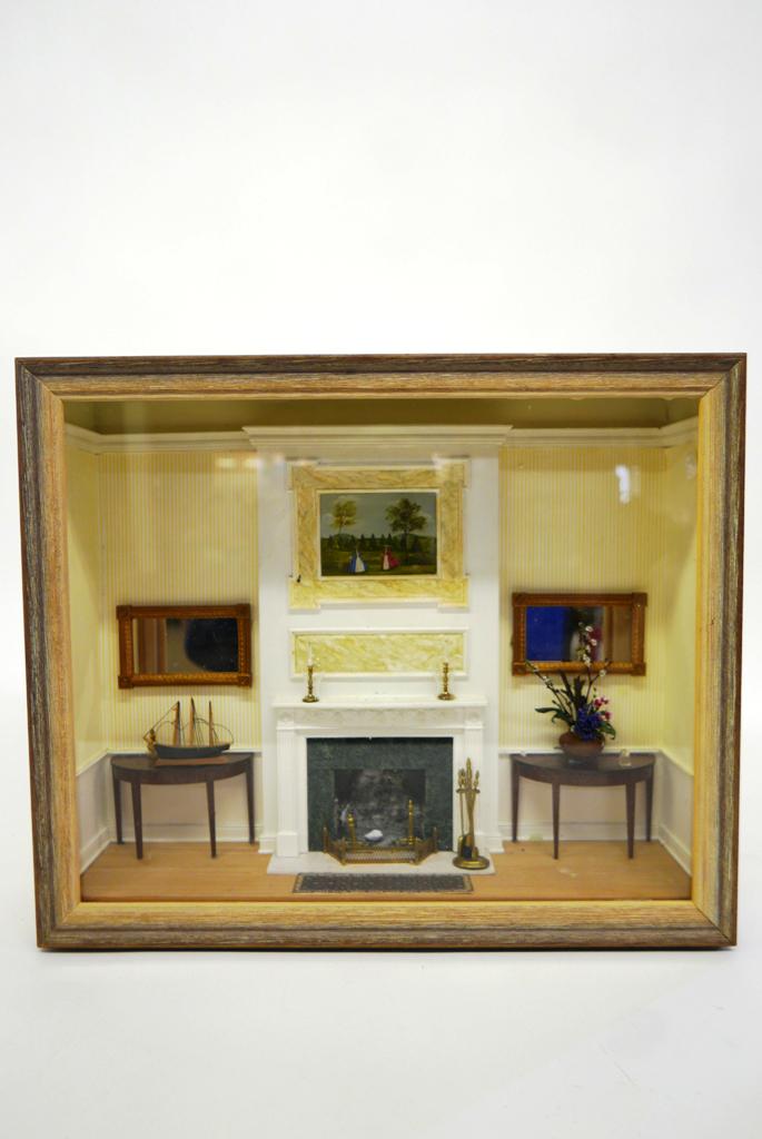 Therese Bahl Furnished Room Box Dollhouse: Shallow room box with a central fireplace with faux marble trim, Therese Bahl hand painted colonial landscape, pair of nice quality unsigned mahogany demilune tables, pair of pier mirrors, brass firep