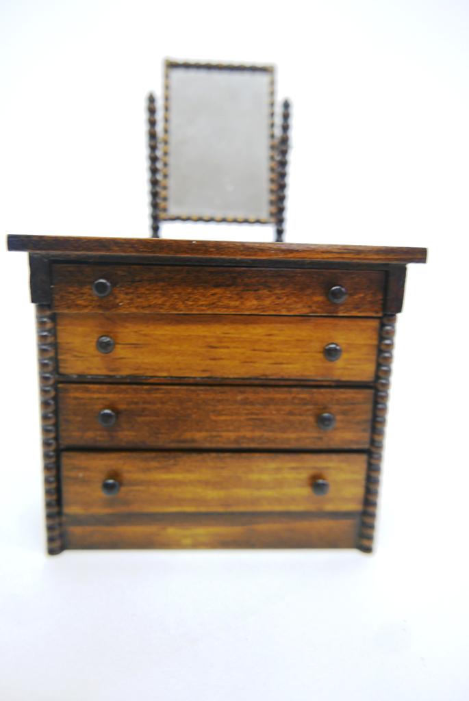 Taller Targione Dollhouse Dresser: Taller Targione nicely colored mahogany four drawer dresser with turned knobs and carved corner columns, matching mirror disassembled for shipping, 3.75"W, 3.25"H excluding mirror