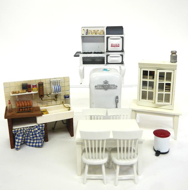 Country Kitchen Appliances , English Sink Miniatures: Solid cast resin American Freezer 4.75"H, Roper cast metal gas style range 4.5"W, farmhouse sink with faux file backsplash 5.25"W, 4.75"H, table 4"W with four matching chairs and china cabinet