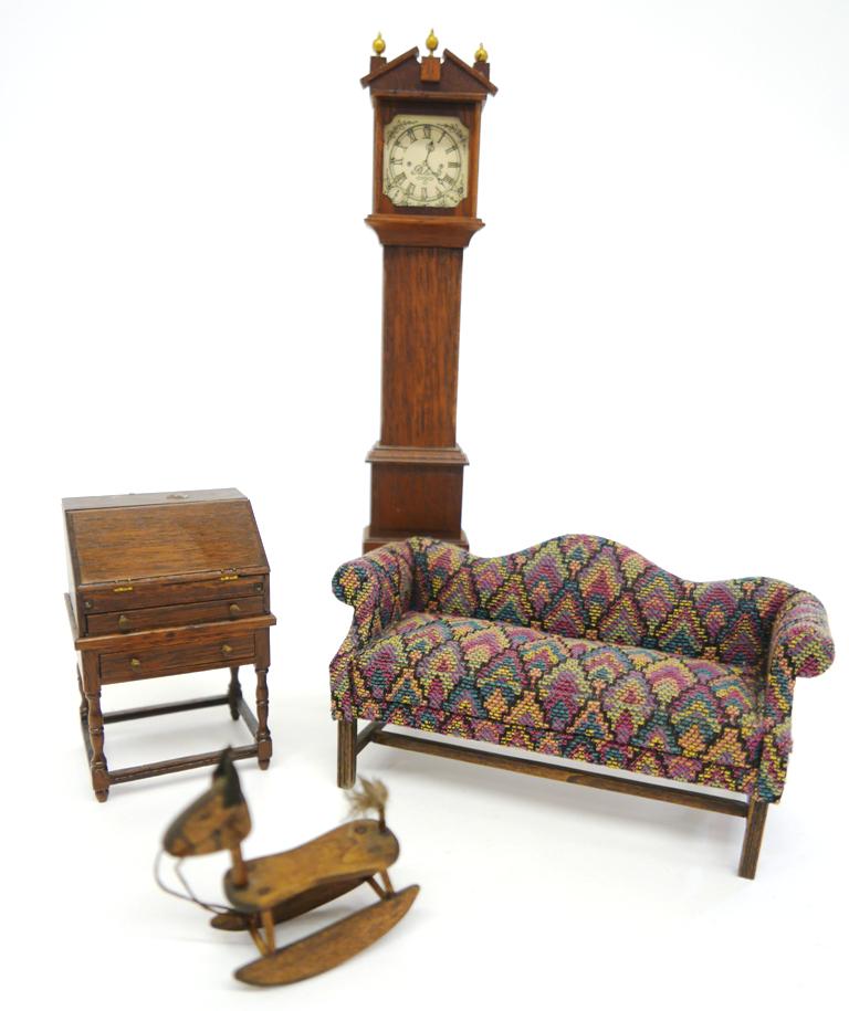 Belt Sofa & Chapman Desk Dollhouse Miniatures: Nellie Belt camel back sofa with mahogany frame 6"W and rocking horse, Jeanne Chapman mahogany desk on stand, slant lid desk with fitted interior, pull-out lopers over a single drawer, base with singl