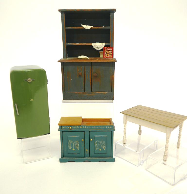 Dollhouse Country Kitchen Fridge & Furniture: J. Howard kitchen table with painted base 4"W, unsigned step back cupboard with well done distressed finish, solid wood GE refrigerator 4.75"H, artisan decorated Dan-Dy painted dry sink signed Paw 4"W