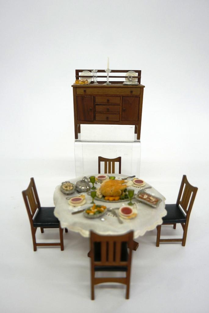 Artisan Dollhouse Mission Dining Room Furniture: Well made unsigned artisan Mission style walnut furniture, round table set for a turkey dinner 4.5"D, sideboard with plate rack 4.25"W and four matching chairs 3"H