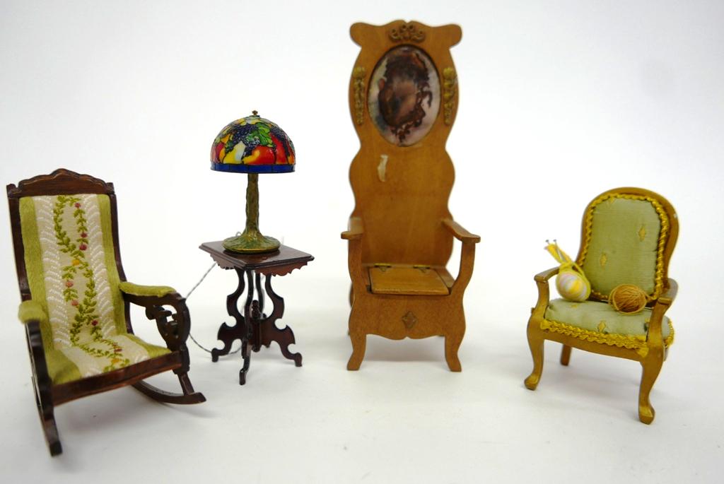 Dollhouse Artisan Parlor Furniture: Nic Nichols upholstered rocking chair with mahogany frame 3.75"H, Allen Martin Victorian side table 2"W with a high quality electrified Tiffany style lamp with tree trunk form base 2.5"H, cherry hall 