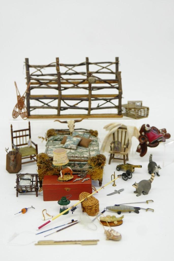 Dollhouse Cabin Furniture & Outdoorsman Accessories: Dollhouse bed decorated with twigs and grasses, pilgrim style armchair, twig magazine rack, log chair with robe, electric horse lamp with bark shade, fish and deer mounts and bull skull, outdoor twig