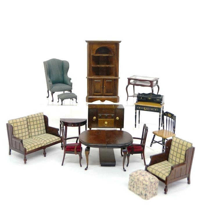 Assorted Commercial Dollhouse Furniture: Corner cabinet 3.75"W, 6.75"H, dining room table with extra leaf and two chairs, demilune table, display case, wing chair with matching ottoman, older floor model radio, upholstered loveseat and match