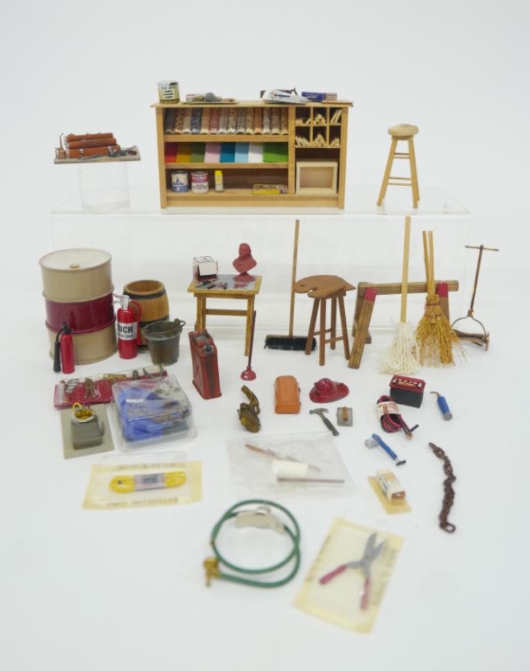 Dollhouse Workshop Supplies & Tools Wright Guide: Dollhouse garage or workshop bench filled with wallpaper rug samples, paints and tools 6"W, work table with clay modeling tools and bust, mahogany stool with artist's palette, oil drum, brass push mow