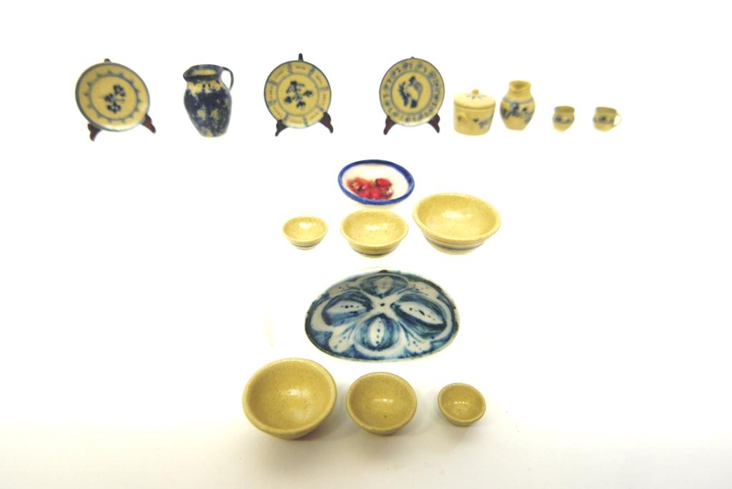 Jane Graber Dollhouse Ceramics & Others: Jane Graber salt glazed miniatures include a blue sponge ware decorated pitcher 7/8"H, two sets of three nested mixing bowls, three plates, butter crock, pitcher missing handle and a pair of cups, B. 