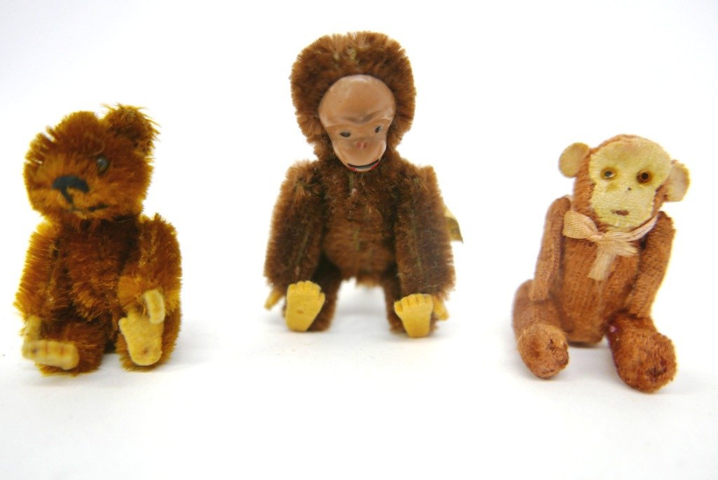 Schuco Style Monkey with push up tongue: Three Miniature Animals, Bear and Monkeys, one has plastic to put up and tongue come out..........similar to Schuco.......very cute!.