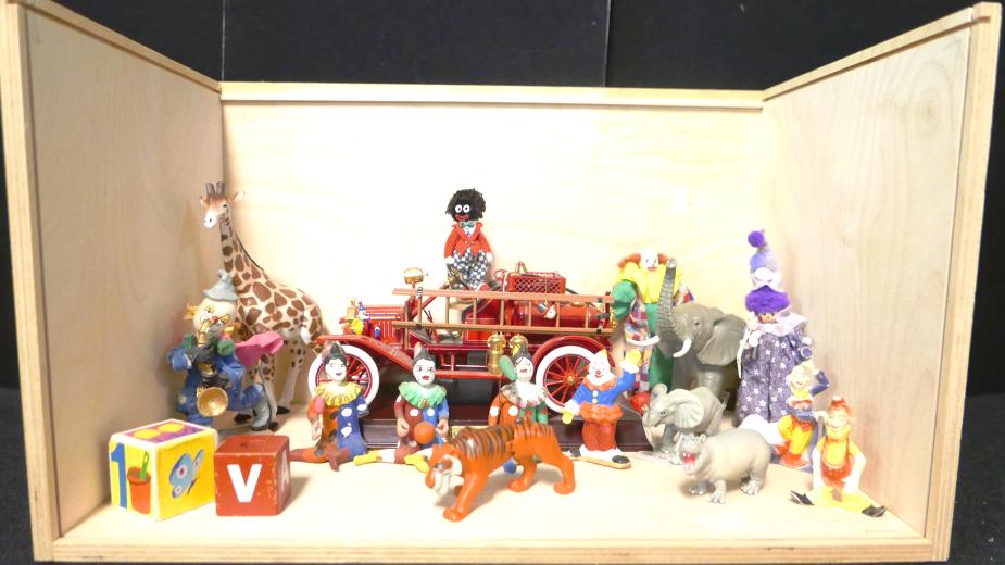 Circus Dollhouse Room Box: Unfinished wood room box with removable Plexiglas top and front, artisan bisque head clown with artisan clay feet 5"H, Ford Model T Fire Engine, three Mexican clay sitting clowns, resin clown with sax
