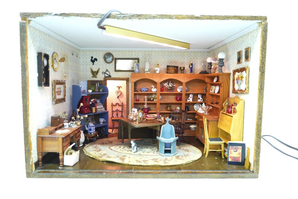 Antique Shop Artist, Steely & Burkey Dollhouse Room Box: Vintage particle board antique shop room box with lights built into the ceiling, wood plank flooring, wallpaper, shelves on three walls loaded with tiny accessories, glassware, china, pewter, brass, b