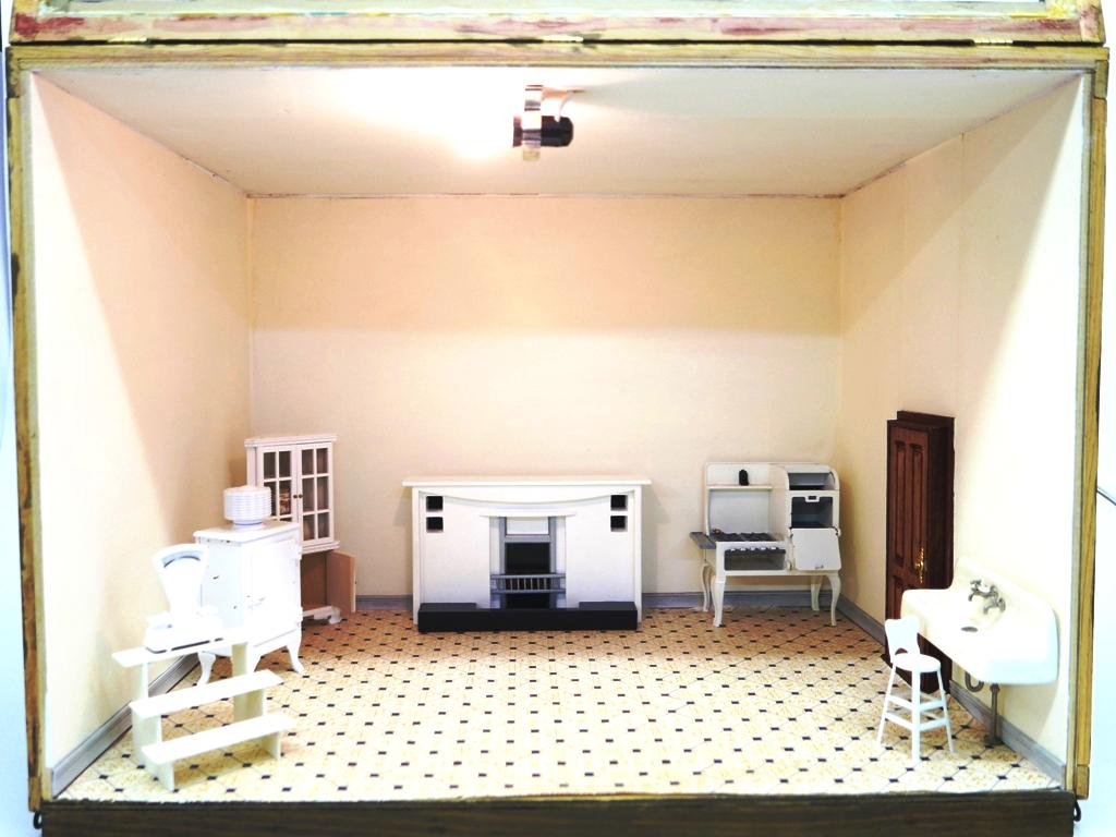 Furnished Kitchen Room Box Dollhouse: Stained wood room box with hinged front cover, , built in ceiling light, painted ceiling, paper covered walls and floor, includes Dee's Delights metal refrigerator and Roper style gas stove, also a me