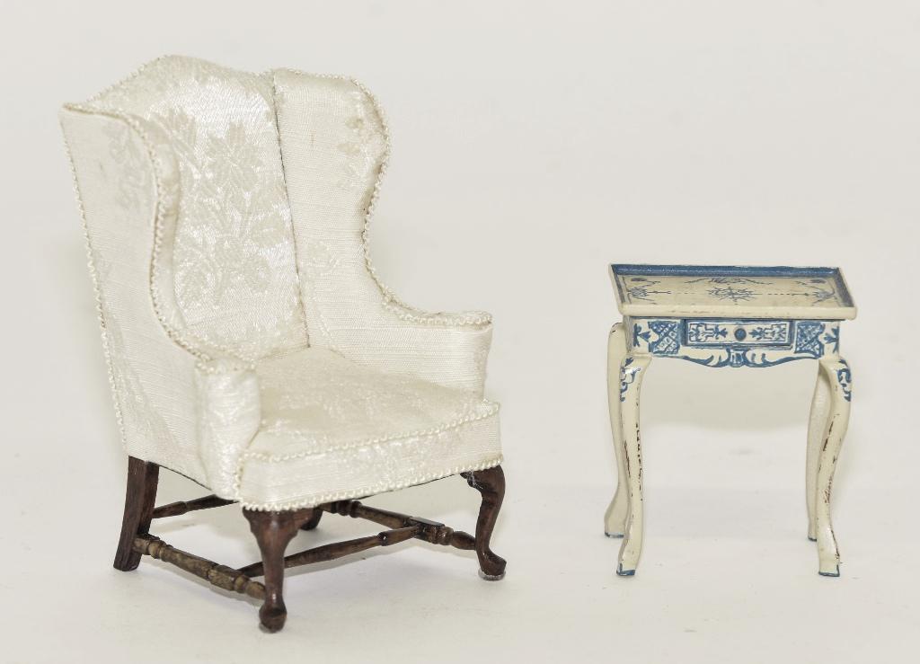 Valentine Wing Chair & Summers Table Miniatures: Betty Valentine upholstered wing chair with rolled arms and turned stretchers 4"H, Nancy Summers single drawer side table painted in the Chinese Chippendale style 2"W