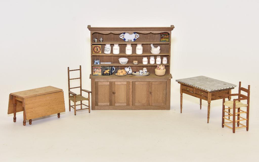 Assorted Artists Kitchen Furniture Miniatures: Pete Jonathan Hunt step back cupboard loaded with ceramic, tin and pewter accessories 7.25"W, 7 3/8"H, Chestnut Hill Studio mahogany drop leaf table with clear finish 4"L, baking table with tin top si