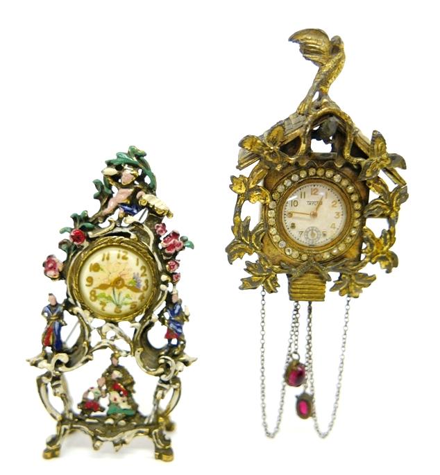Two Vintage Miniature Clock Brooches: Vintage Taylor gold gilt rococo cuckoo clock brooch with working Swiss mechanical movement and spring mounted bird 1.75"W, unsigned figural rococo mantel clock brooch with painted faux dial 3.25"H