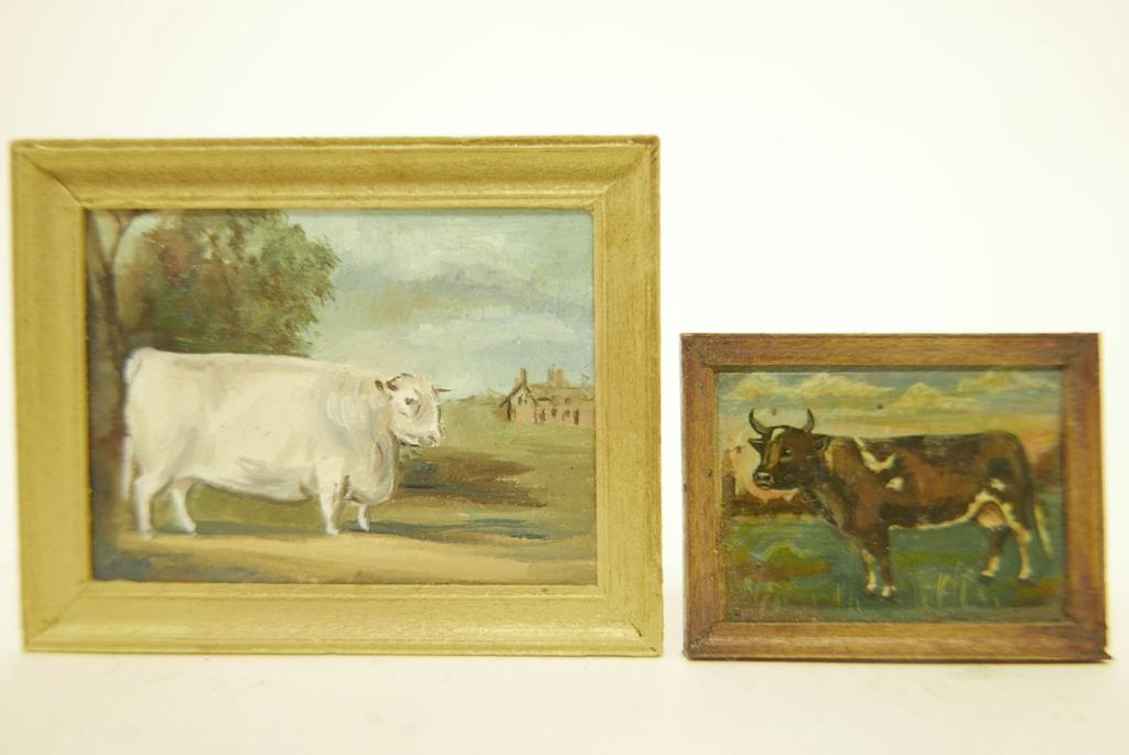 Skinner & Spice Miniature Cow Paintings: Amanda Skinner small cow painting mounted in a dark wood frame 1 5/8"W, 1 2/8"H, Betty Spice painting of a prize cow in a gold painted wood frame 2.5"W, 2"H