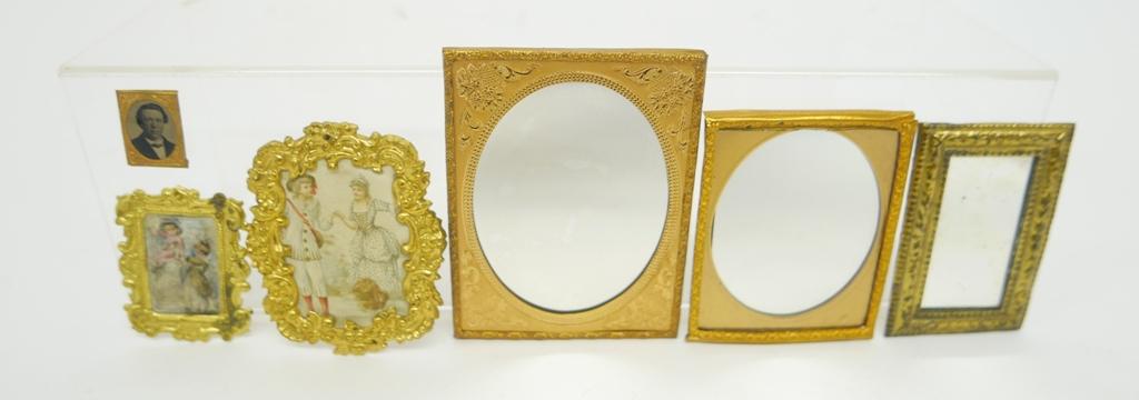 Antique Ormolu Mounted Pictures & Mirrors Miniatures: Antique print of a courting couple dated 1912 on back mounted on a rococo style frame 2.75"W, 3.25"H, two oval mirrors in 19th century frame inserts, rectangular mirror in frame 2.25" by 3.25", antiqu