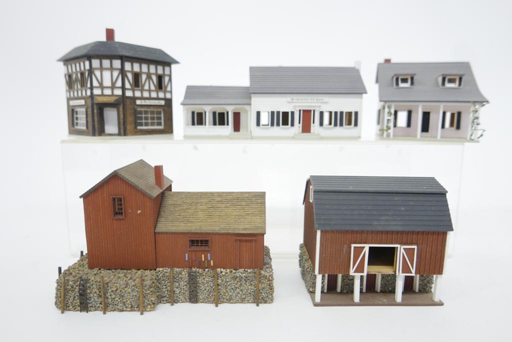 G. & M. Gudgel Five Tiny Dollhouses: Five signed G & M Gudgel tiny dollhouses, The Enchanted Dollhouse 6.25"L, open back cottage also signed by Loraine Clancy 3 1/8"W, Ye Old Curiosity Shop Tudor style corner store also signed by Loraine