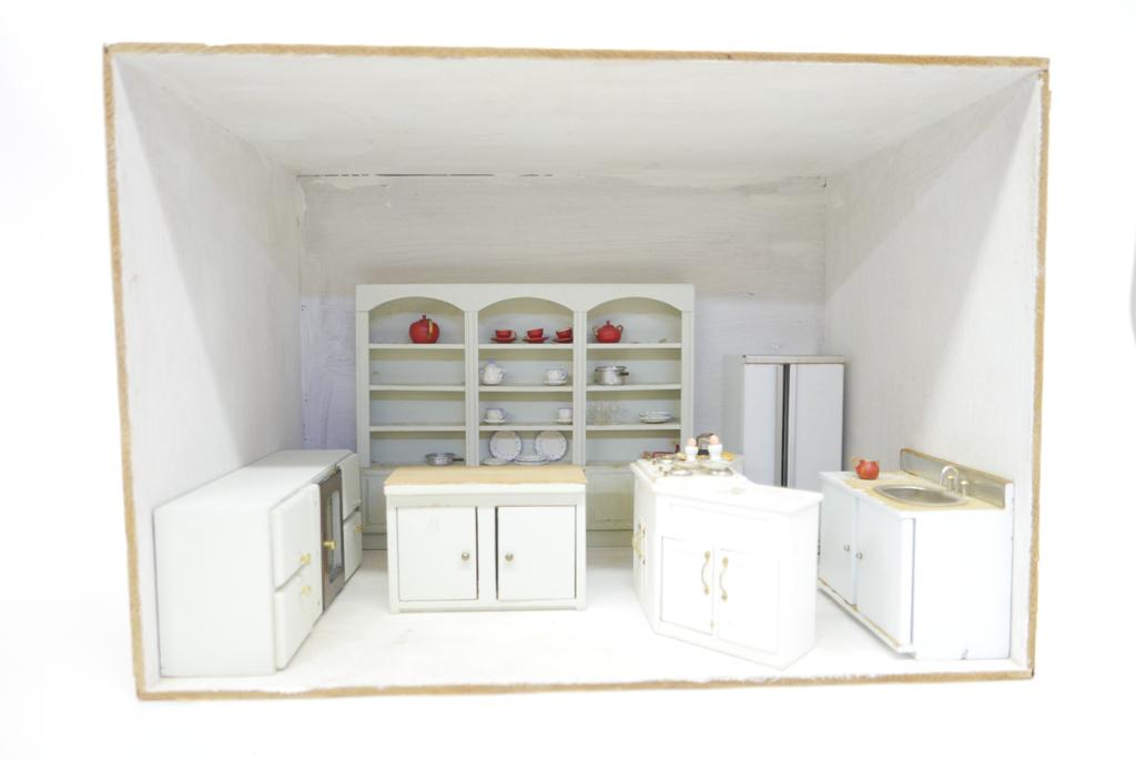 Small Dollhouse Kitchen Room Box: Wood room box with painted interior, wood display shelving with small accessories, wood curved counter with range top, cabinet with built in stove, wood refrigerator, counter and sink cabinet, 16"W, 1