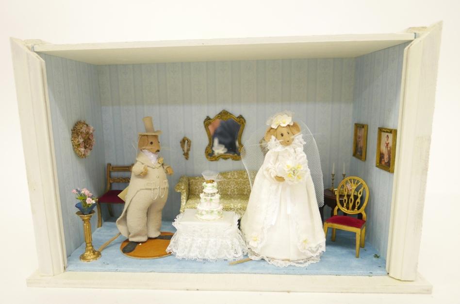 Mouse Wedding Room Box Dollhouse: Painted wood room box has a paper interior with wall to wall carpeting and a removable Plexiglas front, contains a Diane Freeman mouse bride 6.25"H and groom 6"H, commercial sofa, chairs, table, mirro