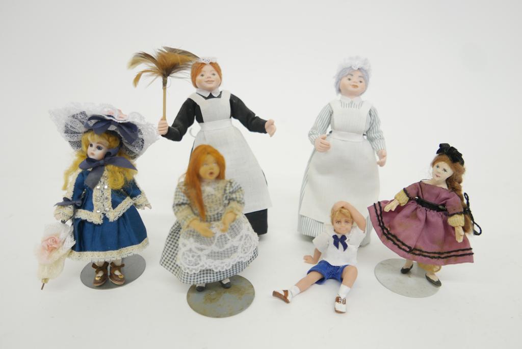 Dollhouse Artisan Children & Maids Dolls: J. Verona bisque child in lace trimmed dress and bonnet with parasol and leather shoes 4.5"H, Darla Knox artisan clay seated boy wearing sailor suit 2.25"H, artisan clay girl wearing herringbone dress
