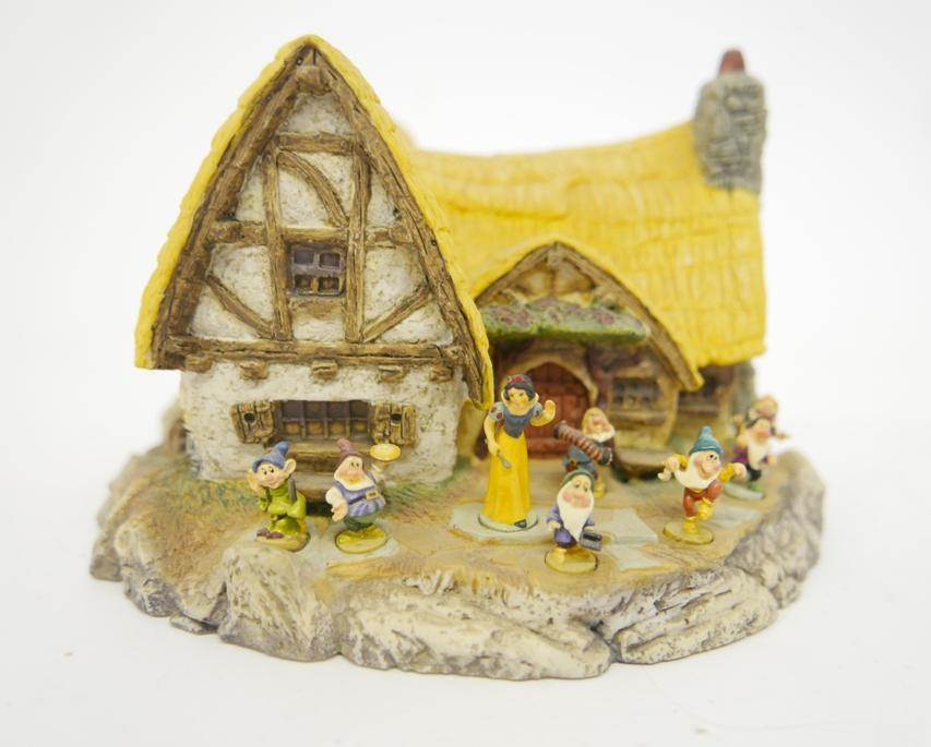 Olszewski Snow White & 7 Dwarves With House: Olszewski Goebels Disney Collection painted metal figures of Snow White 1 3/8"H and seven dwarves, cast resin cottage with recessed spot for each figure 8"W