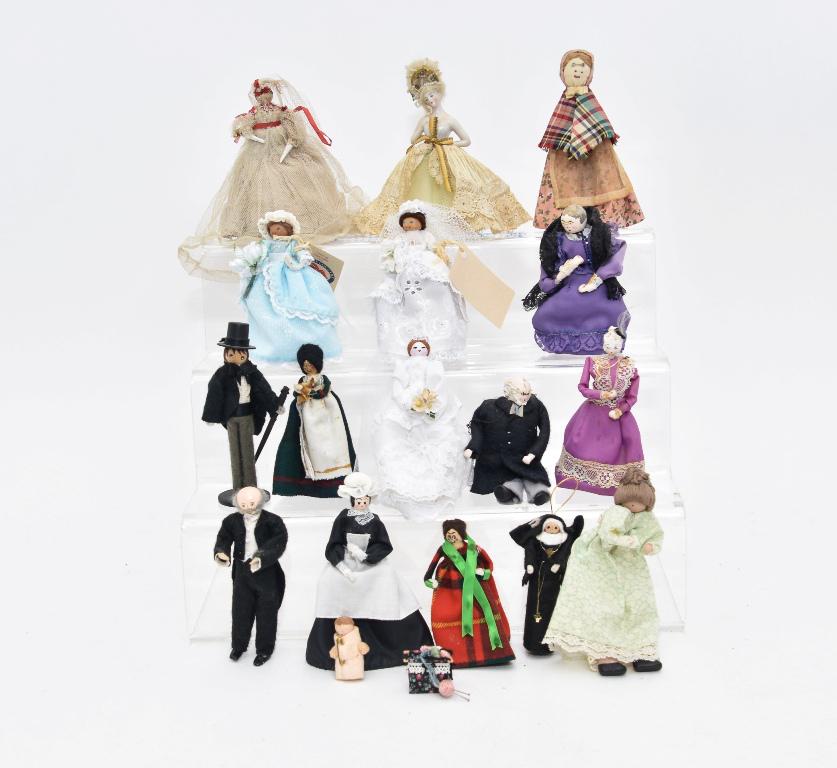 Seventeen Wood, Wax & Fabric Dollhouse Dolls: Group of ten wood peg and clothes pin dolls including two made by Marion Gray for The Genesee Country Museum 5"H, vintage china half body doll with lace dress 5.5"H, cloth head doll 6"H, wax doll made