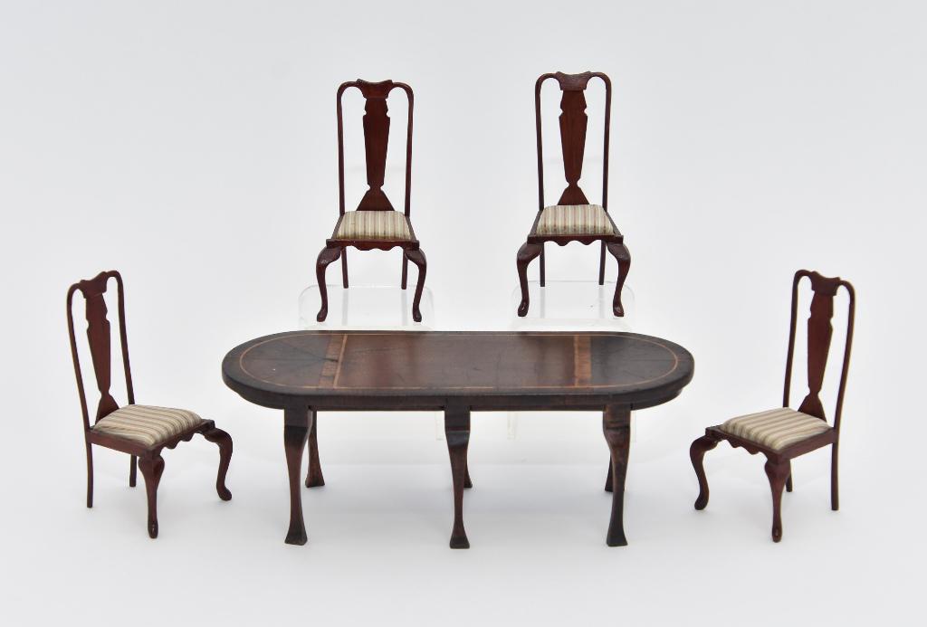 Trail-Hill & Sherwood Dining Room Miniatures: C.J. Trail Hill oval dining room table, top is covered with burl veneer, mahogany cross banding and stringing on six cabriole legs 7 1/8"L, 2 5/16" W, 2.5"H, includes four Roy Sherwood mahogany Queen