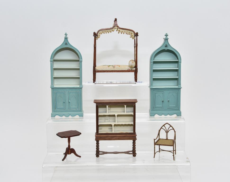Cochran & Singing Tree Dollhouse Bedroom Furniture: H.P. Cochran mahogany high post bed with peaked canopy 5"L, 2.75"W, 7"W, pair of Singing Tree painted Gothic revival cabinets 3.25"W, 8.75"H, Colin & Roberson bamboo style cast metal painted chair 3.2