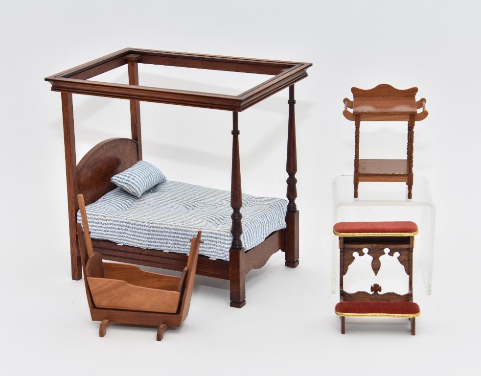 Jenvey, Anderson & others Bedroom Dollhouse Furniture: Dennis Jenvey mahogany high post bed with flat canopy has headboard with burl veneer and crosshatch inlay, tufted mattress and matching pillow 7"L, 5"W, 6.75"H, Carl L. Anderson cherry swinging cradle