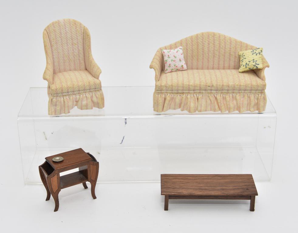 Ruff & Carlisle Living Room Miniature Furniture: Robert Carlisle 1930's style mahogany side table with magazine racks on sides 2.75"W, d Anne Ruff sofa 6"L with matching armchair 4"H, unmarked mahogany coffee table 4 5/8"W