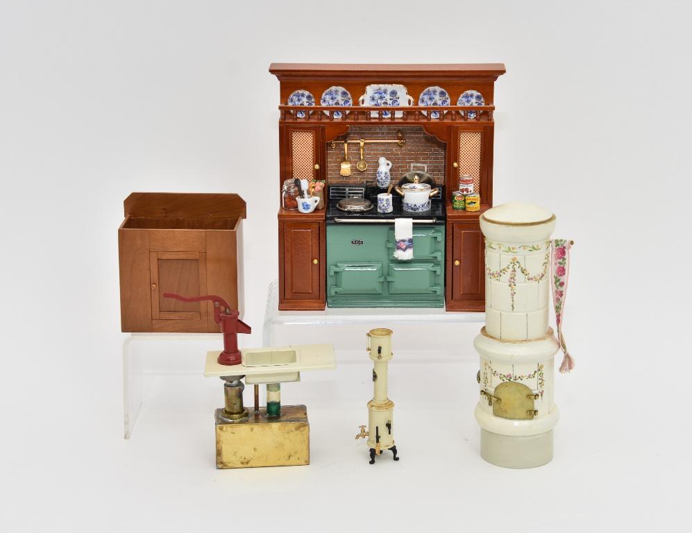Carlisle & Reutter Kitchen Cabinets Miniatures etc.: Robert Carlisle cherry sink cabinet has a real working water pump with copper reservoir 3.5"W, Reutter AGA stove with wood cabinet surround loaded with accessories 6.5"W, 6.75"H, LCB European style ha