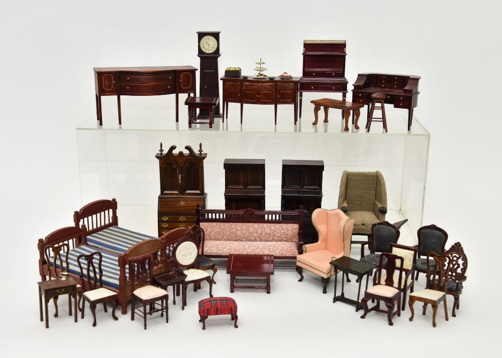 Large Lot Of Commercial Dollhouse Furniture: Lot includes a pair of beds 7"L, sideboards, bookcases, desks, wingchair, tall case clock, sofa, music stand, variety of small tables and chairs