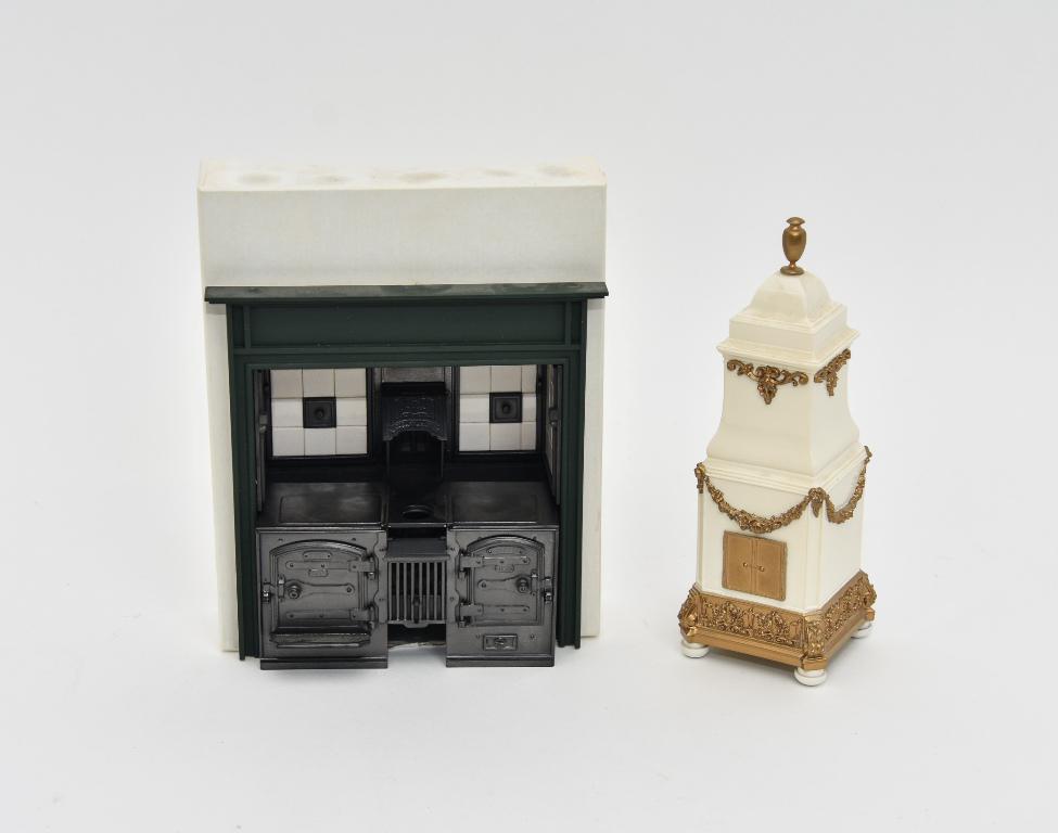 Kitchen Stove & Heater Dollhouse Miniatures: Solid metal European style range in a wood surround with ceramic tiles 6"W, 6 1/8"H, 2 1/8"D, cast resin European style heater signed D 7"H