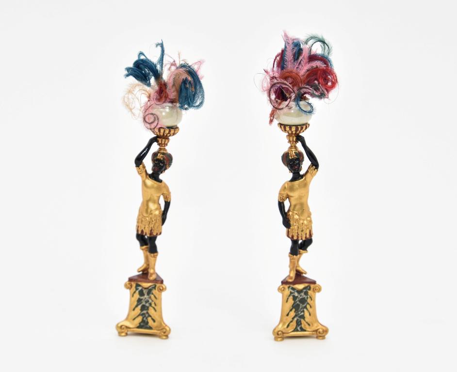 Pair John Hodgson Blackamoor Pedestals Miniatures: John Hodgson pair of artisan black moor pedestals, gold gilt with faux ebony and malachite painting 4.5"H, comes with a pair of Vince Stapleton pink luster pots with feather decorations 6.5"H overall