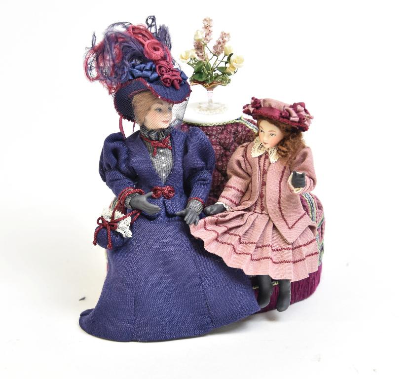 Rae Lynn Dolls & Nichols Sofa Dollhouse Miniatures: Nic Nichols artisan "Bourne" round sofa with tufted upholstery 4.5"D comes with two bisque Rae Lynn dolls