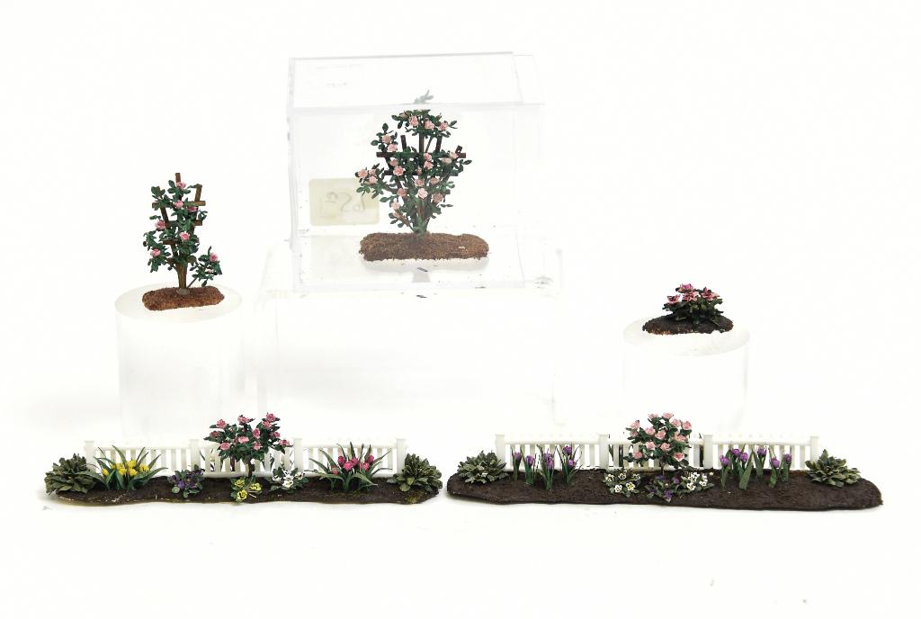 Dollhouse Small Scale Artisan Flowers & Beds: Nice selection of artisan 1/4" and 1/2" scale dollhouse plants all in original packaging, pair of flower beds with white picket fence 5"L, two climbing rose bushes on wood trellises, small plant