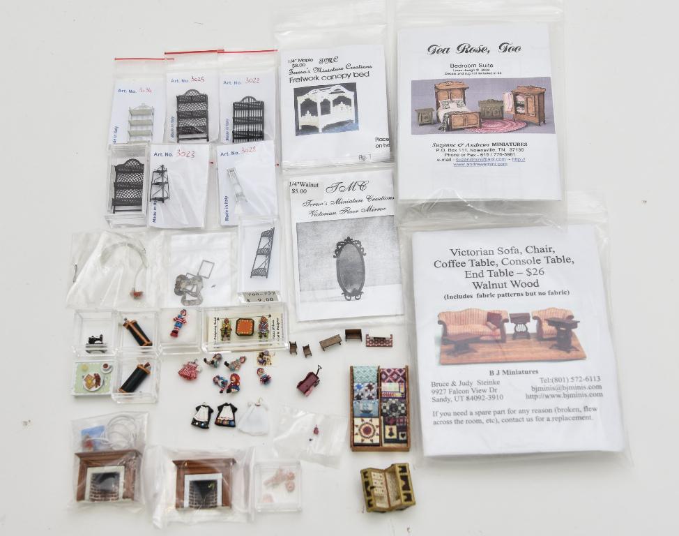 Dollhouse 1/4" Scale Dollhouse Accessories: Five 1/4" scale dresses by Karen Gibbs and other, wood rack with eight quilts 2"H, travel trunk with a nicely fitted interior, sewing machine, breakfast tray, two golf bags with clubs, vanity perfume 