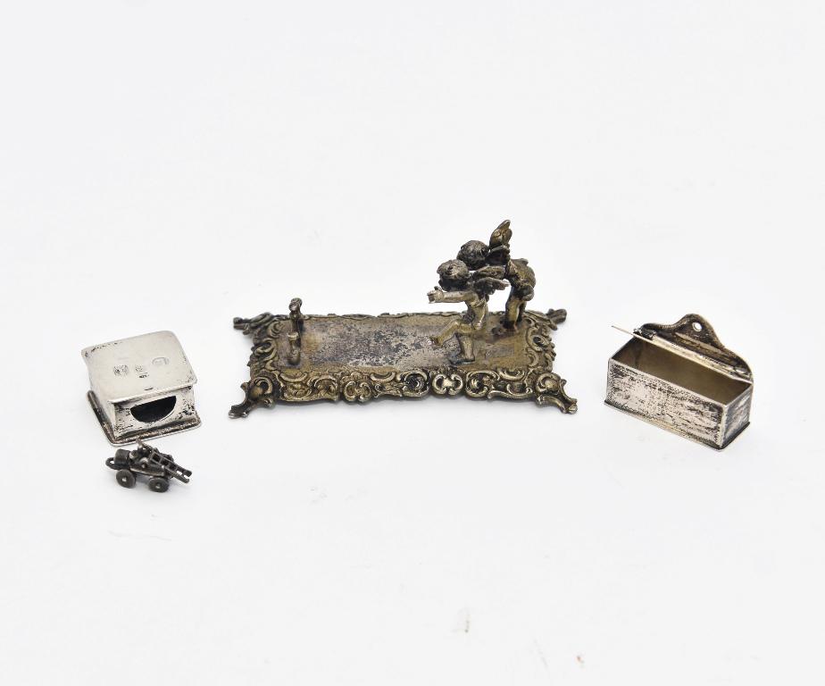 Antique Dutch Silver Dollhouse Miniatures: Antique Dutch silver candle box with hinged lid decorated with wiggle work and has Dutch silver hallmarks 1 3/8"W, antique Dutch silver foot warmer has Dutch silver hallmarks 11" square, antique novel