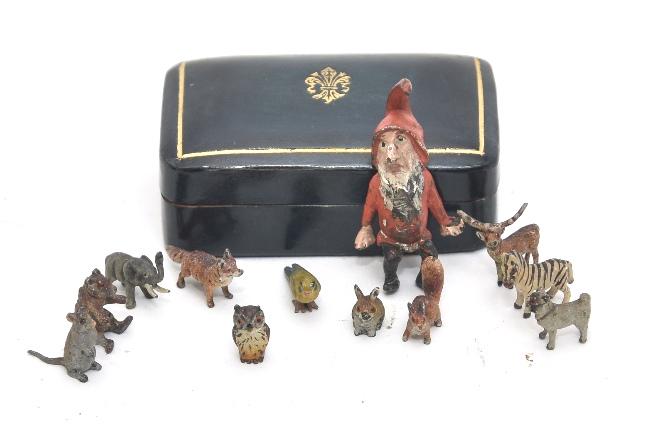 Group of Antique Small Austrian Bronze Animals: Ten small painted Austrian bronze animals include fox 7/8"L, owl, bear, squirrel, zebra, stag, mouse, elephant, bird and dog, bronze elf 1.5"H and a lead rabbit